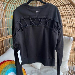 SOLD// Alo Yoga Lace Up Hook Up Sleeve Long Sleeve Pullover Sweater size Medium
